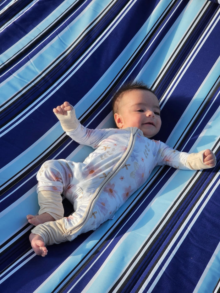 Baby wearing Little Bond Co bamboo pajamas